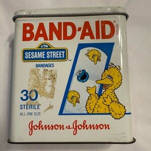 Vintage bandaid Sesame Street tin can- empty tin